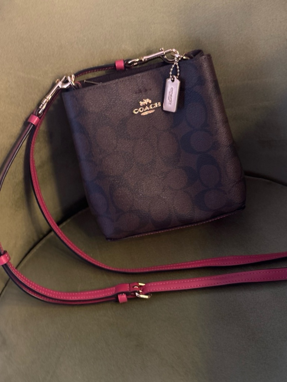 Coach Black Signature Canvas Crossbody with Pink Strap Accent